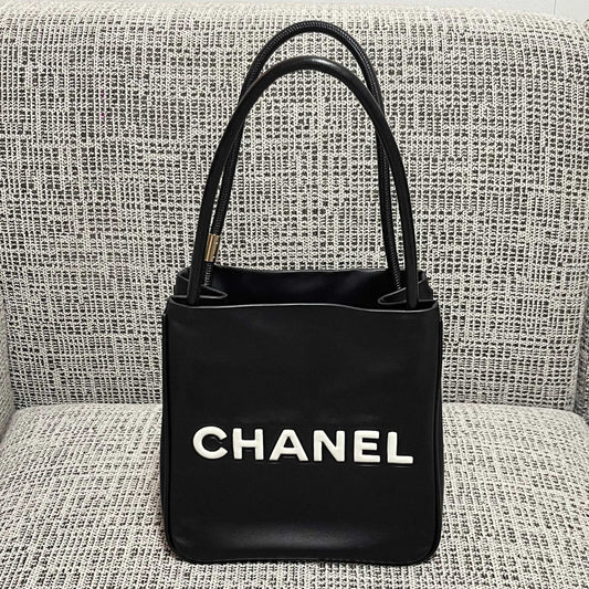 Chanel 2026 Camellia Letter Reversible Tote Bag 25cm Black White Leather